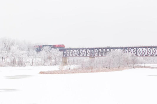 CP Train crossing train Bridge by GCI in Cambridge in the winter Photo by Cambridge Ontario Photographer Laura Cook of Vision Photography 